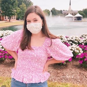 Vestique pink and white smocked puff sleeve top